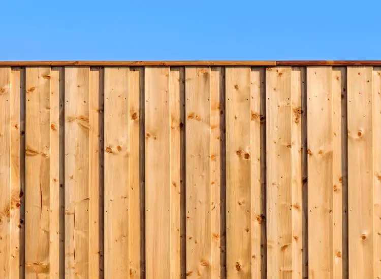 How to Clean a Wood Fence Without Pressure Washing